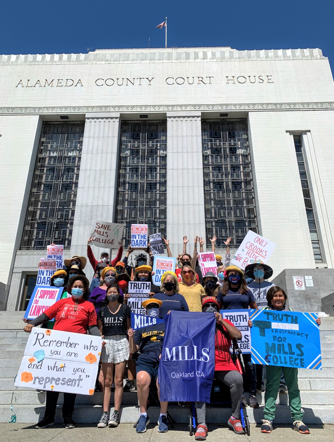 All4Mills and students rally outside the Alameda County Courthouse to demand answers from Mills admin. Joyce Yee.